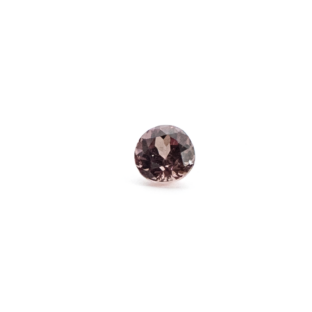 カラーチェンジガーネット 0.4ct｜光を重ねて、密やかに表情を変える石。
